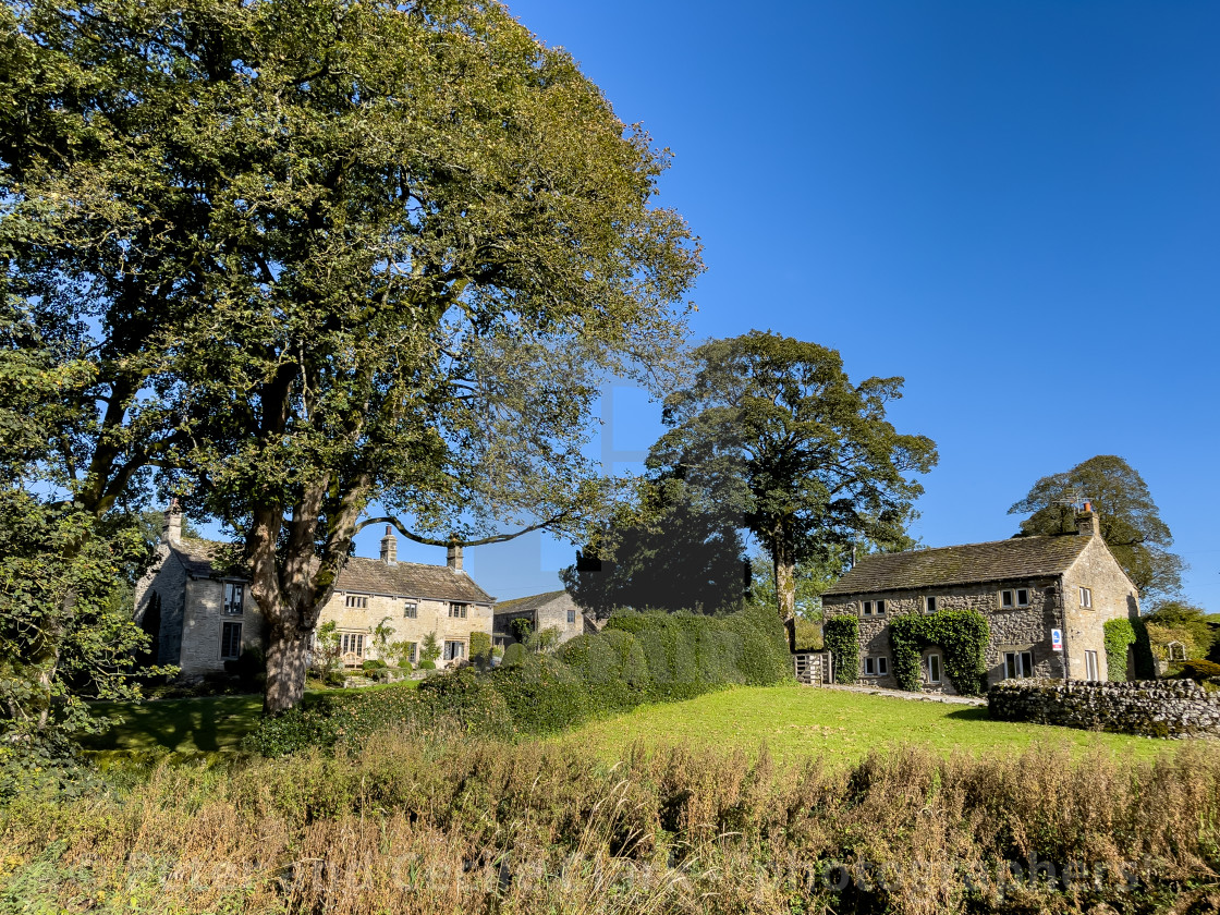 "Idyllic Yorkshire Cottage and Stream." stock image