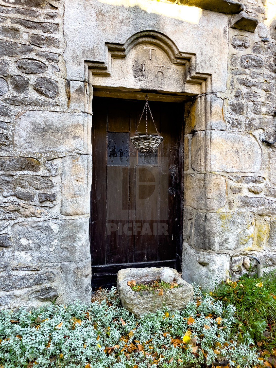 "Ornate Yorkshire Dales Cottage Entrance Doorway. Linton in Craven." stock image