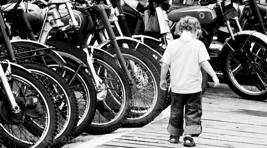 "Boy and Motorcycles" stock image