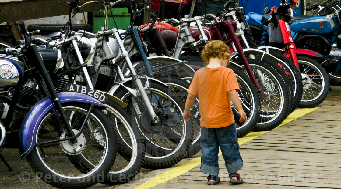 "Boy and Motorcycles" stock image