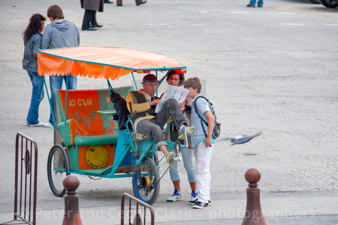 "Ecological tricycle taxi service, in Paris, France." stock image