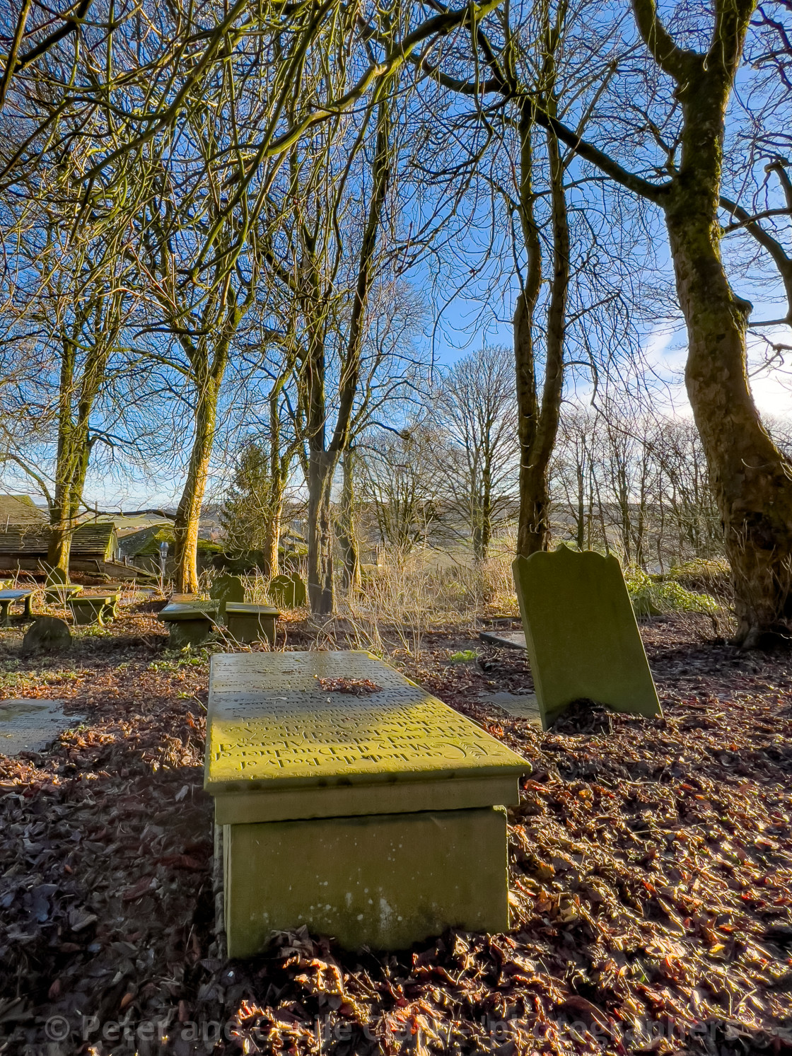 "Tombstone and Graves, St Michael and All Angels' Church, Haworth, Yorkshire. Bronte Country." stock image