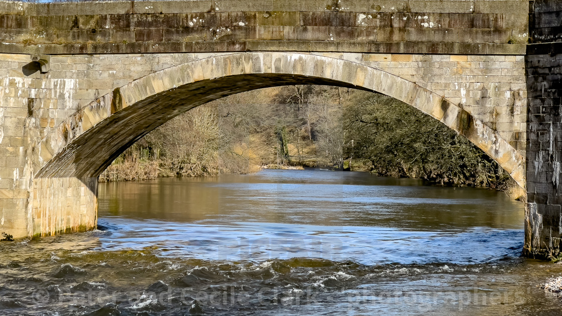 "Bridge Arch over River Wharfe at Burnsall." stock image