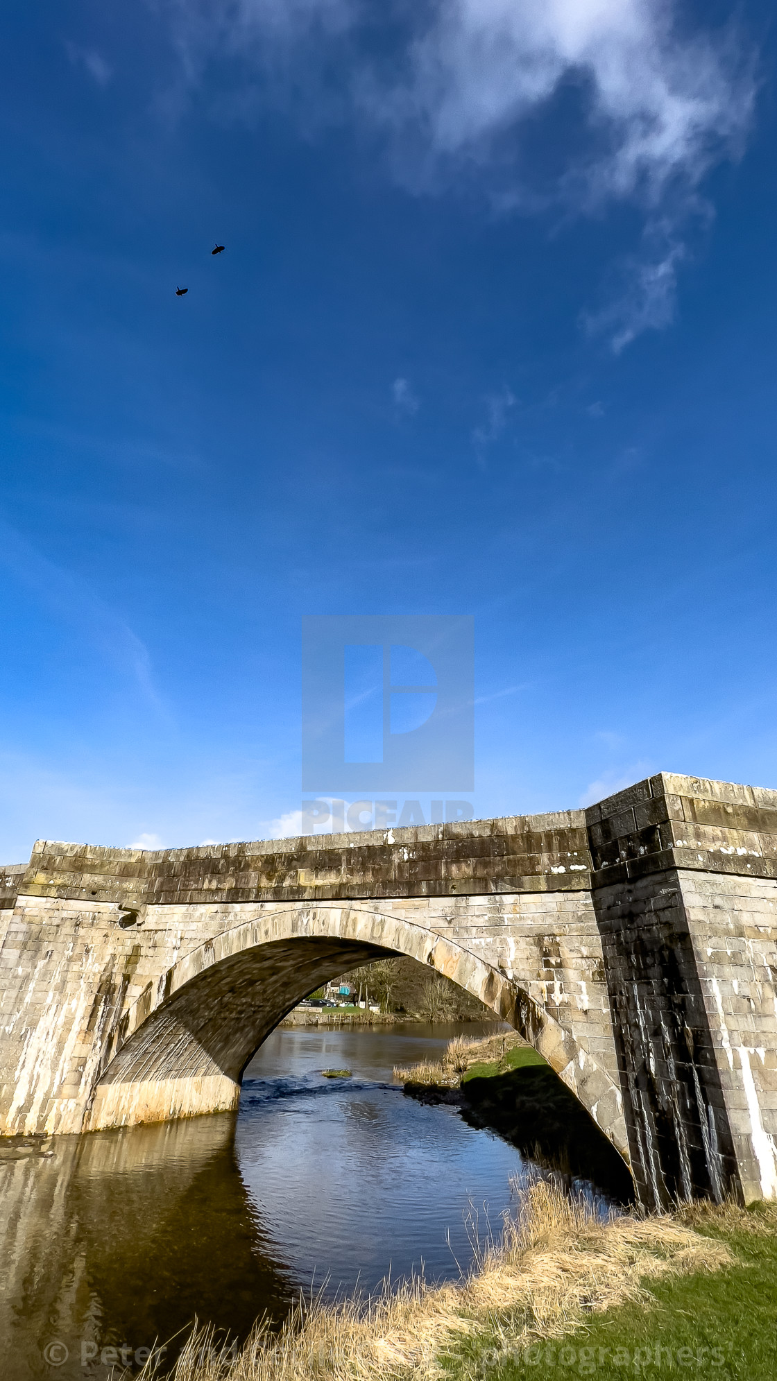 "Burnsall Bridge, over The River Wharfe, Burnsall." stock image