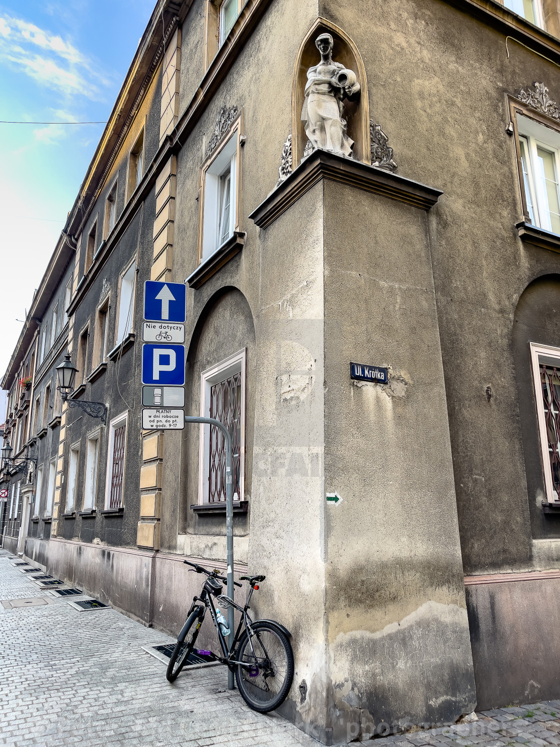 "Bicycle Parked at Corner Ul Krotka, Gliwice, Poland" stock image