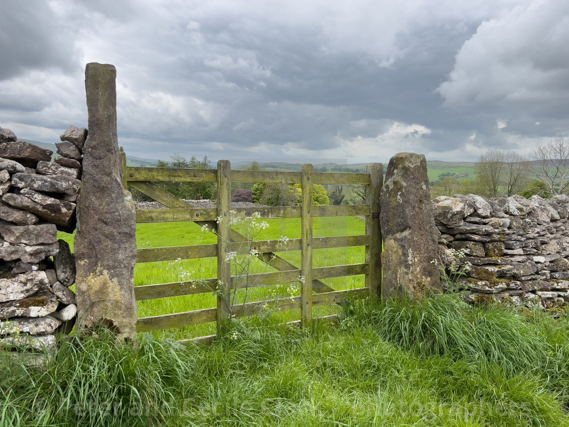 "Yorkshire Dales Dry Stone Wall and Gate." stock image