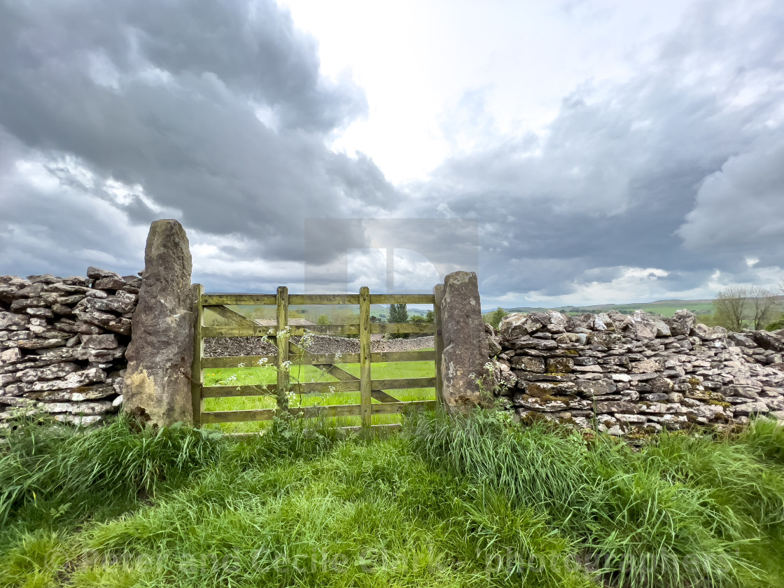 "Yorkshire Dales Dry Stone Wall and Gate." stock image