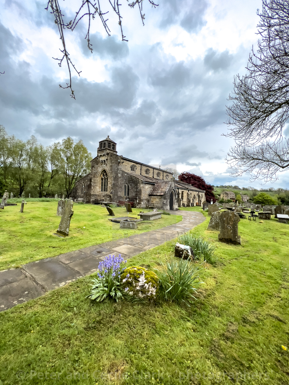 "St Michael and All Angels Parish Church and Cemetery, Linton in Craven." stock image