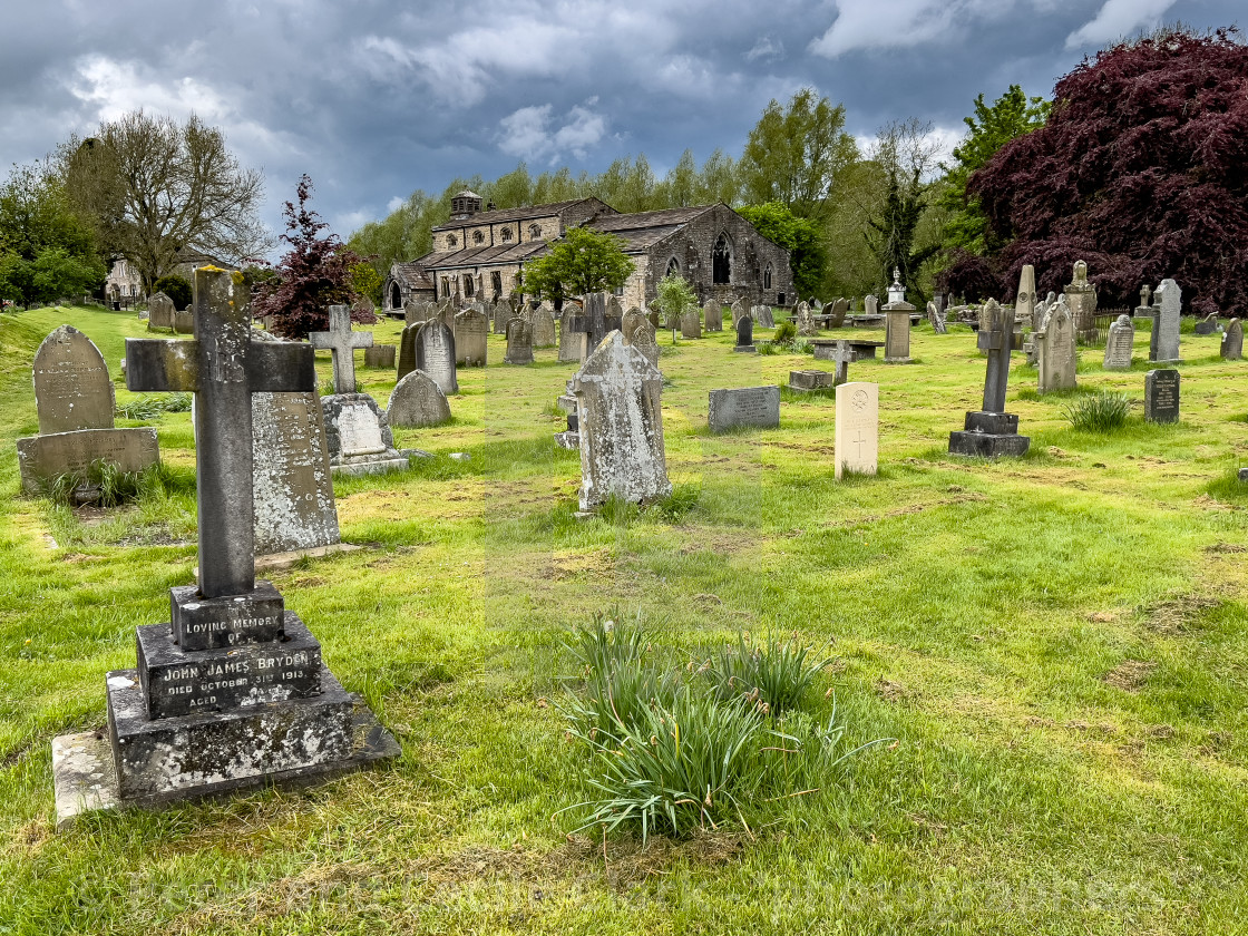 "St Michael and All Angels Parish Church and Cemetery, Linton in Craven." stock image