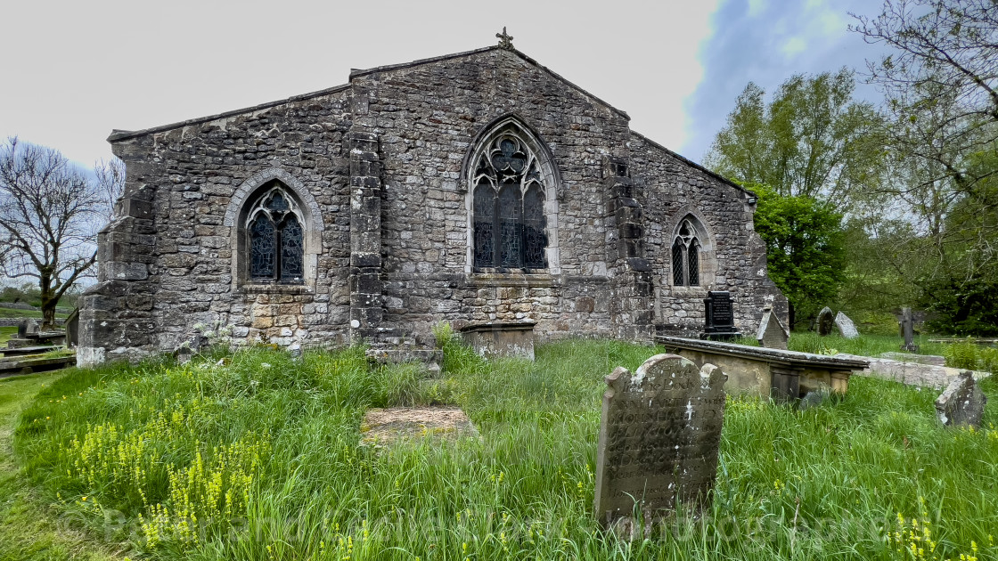 "St Michael and All Angels Parish Church and Cemetery, Linton in Craven." stock image