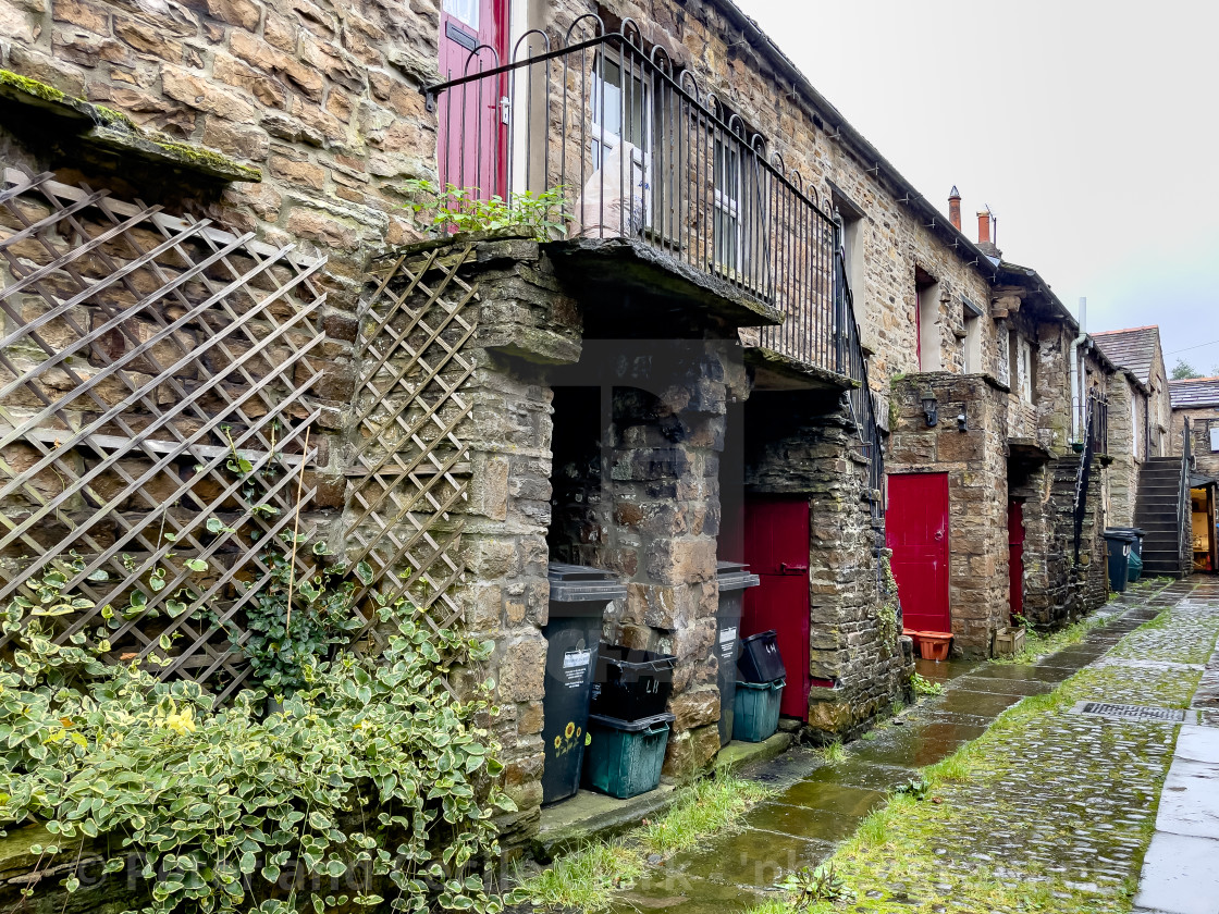 "Hawes, Cobbled Street and Stone Built Terraced Street." stock image