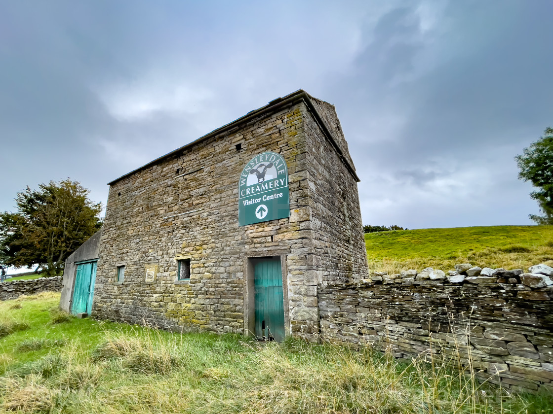 "Wensleydale Creamery Sign on Old Barn." stock image