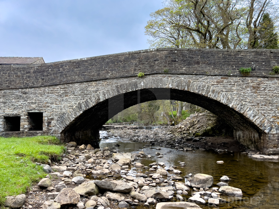 "Hardraw Beck, Arched Stone Bridge." stock image