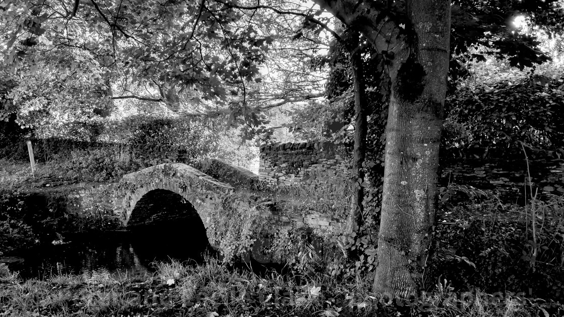 "Arched Stone Bridge, Addingham, Yorkshire." stock image