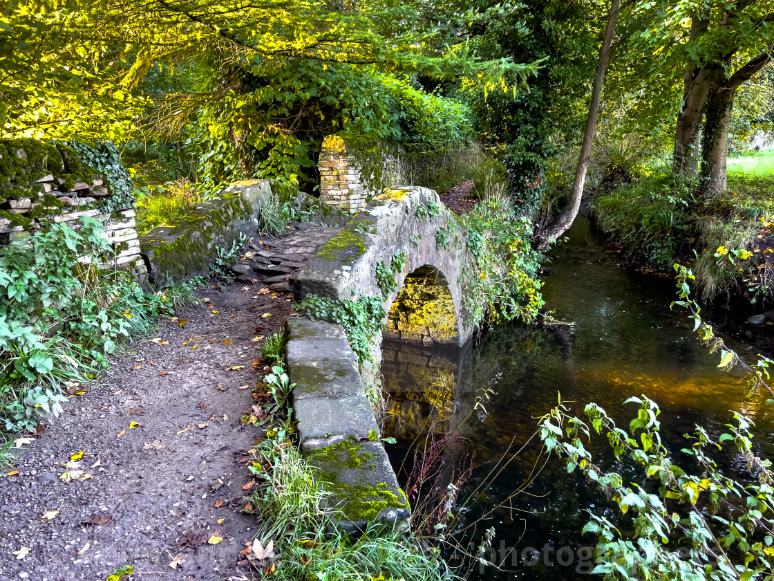 "Arched Stone Bridge, Addingham, Yorkshire." stock image