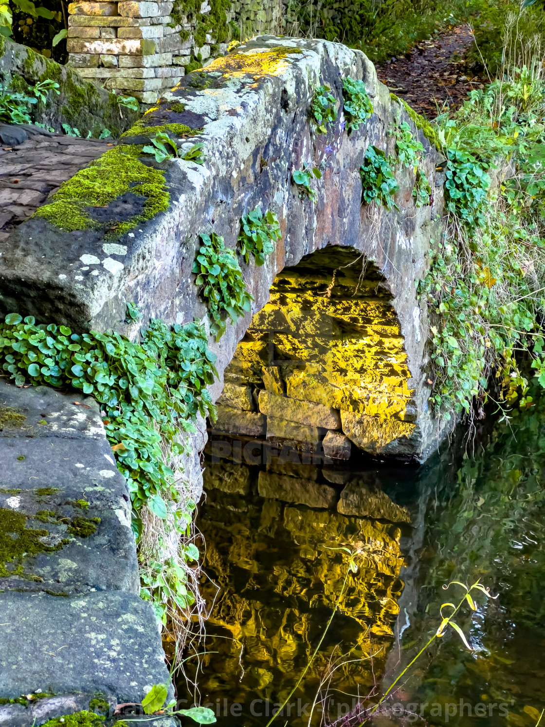 "Arched Stone Bridge, Addingham, Yorkshire." stock image