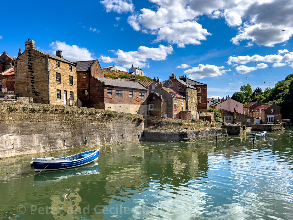 "Fishing Cobble moored in Staithes Beck." stock image