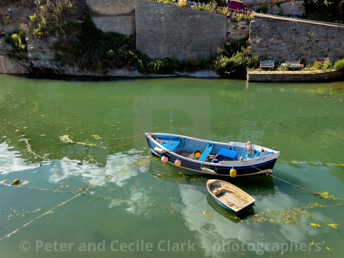 "Fishing Cobble moored in Staithes Beck." stock image