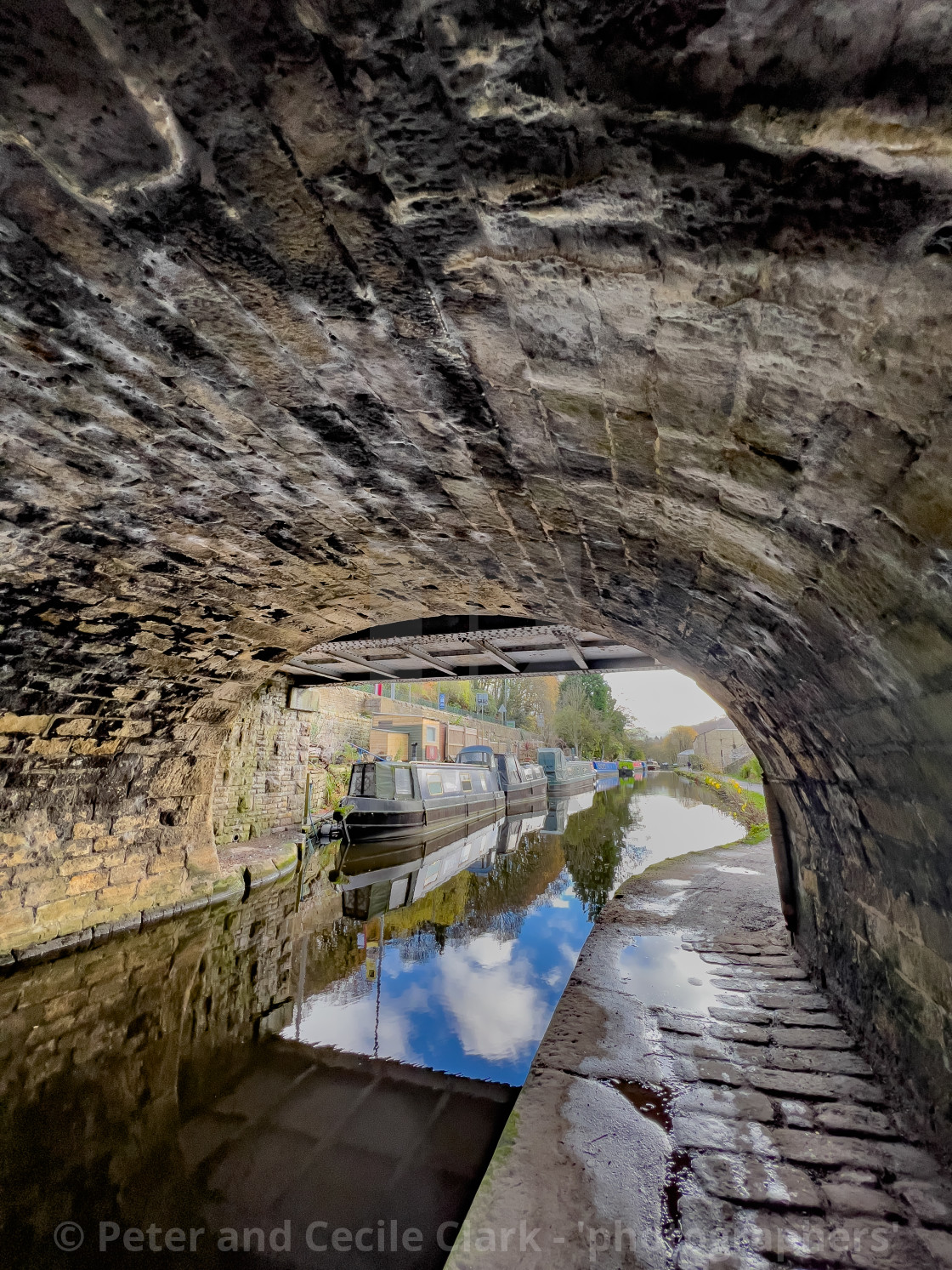 "Rochdale Canal Path under Bridge and Barge, Hebden Bridge." stock image