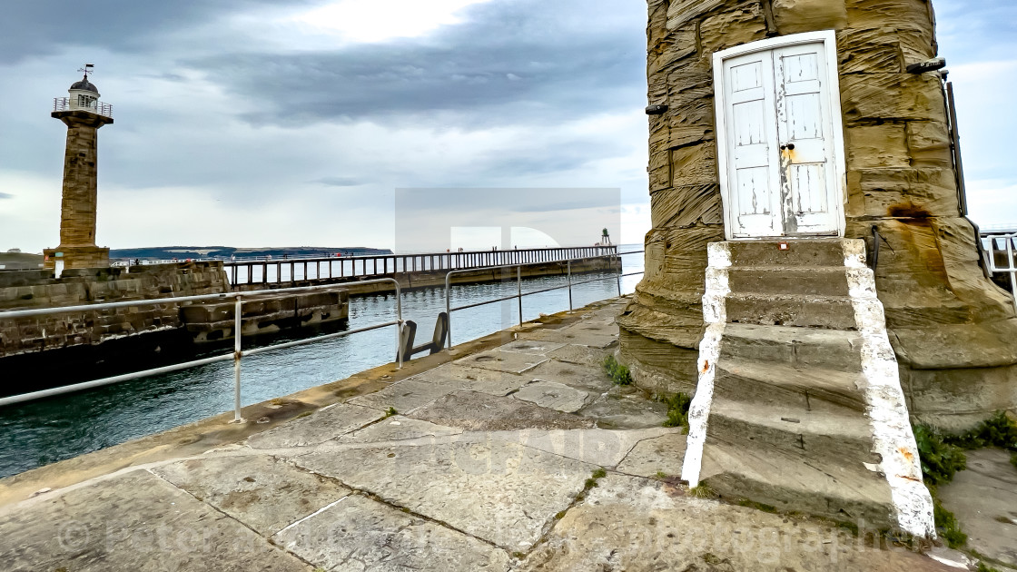 "Lighthouse and Pier, Whitby" stock image