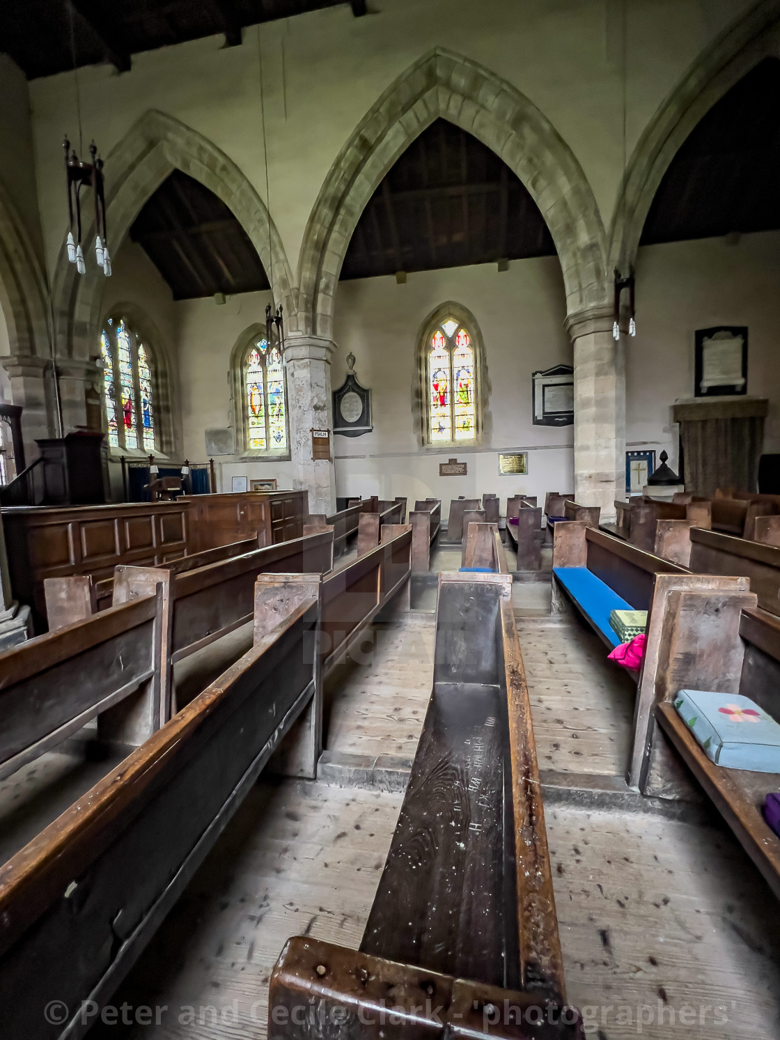 "Wensley Holy Trinity Church, Internal Stone Arches and Pews." stock image