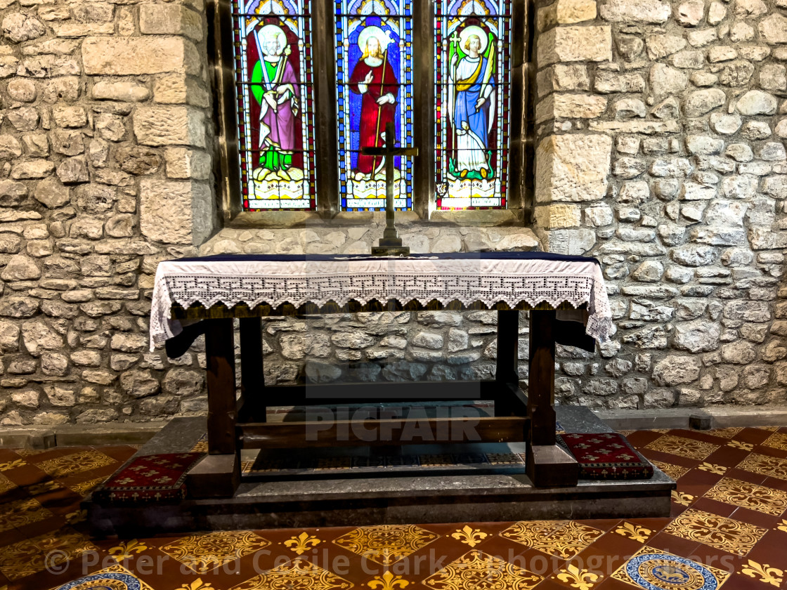 "Altar and Stained Glass Window in the Church of Saint Oswald, Arncliffe." stock image