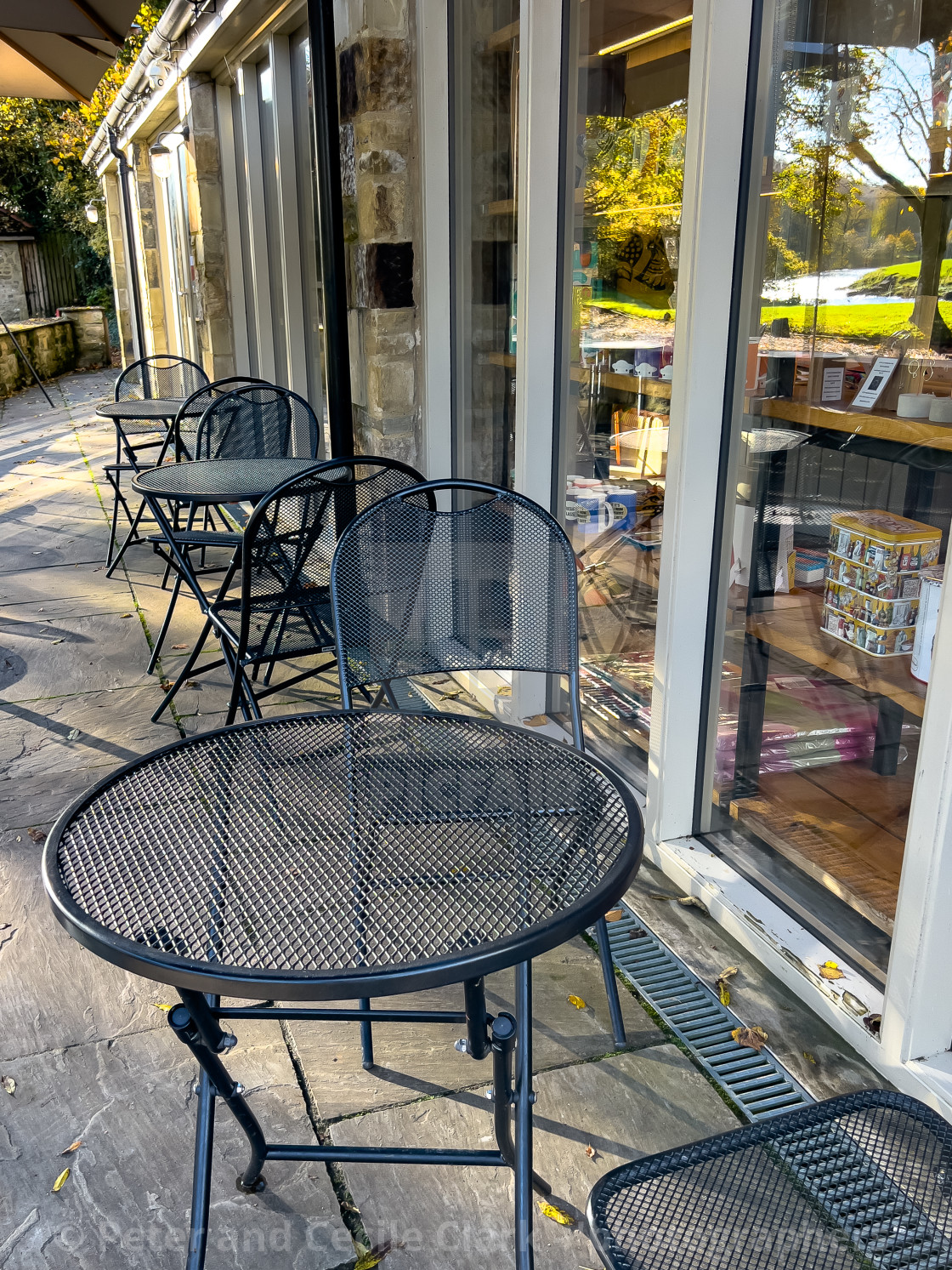 "Bistro table and chairs at Riverbank, Coffee shop, Burnsall, Yorkshire Dales." stock image