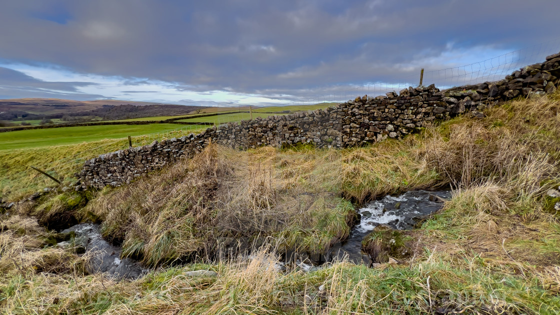 "Stream alongside Moor Lane, above the Yorkshire Dales village of Grassington." stock image