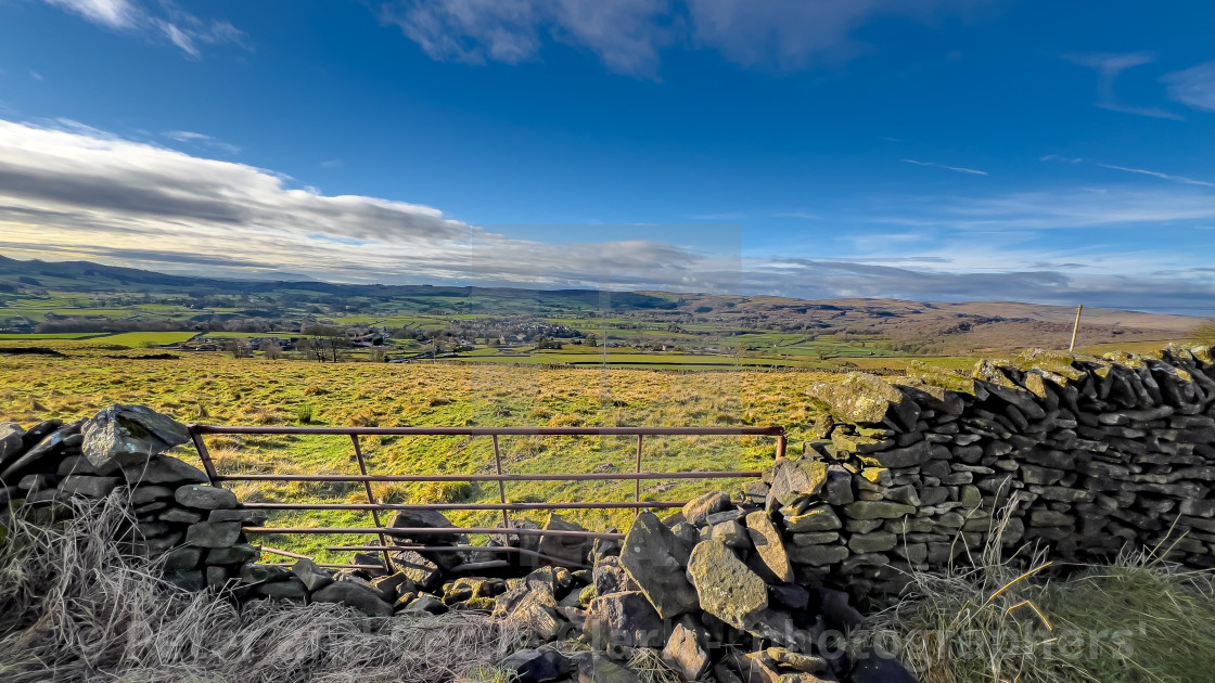 "Edge Lane, near Grassington. A fine Example of a Walled Track., common in the Yorkshire Dales, England, UK. In sunshine after a shower." stock image