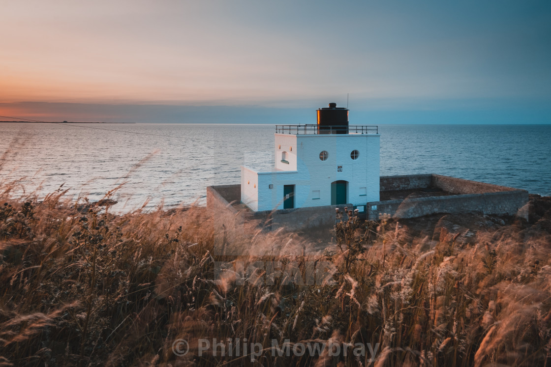 "Orange and Teal Bamburgh Lighthouse, Northumberland" by Philip Mowbray - $14.78 "Orange and Teal Bamburgh Lighthouse, Northumberland" stock image