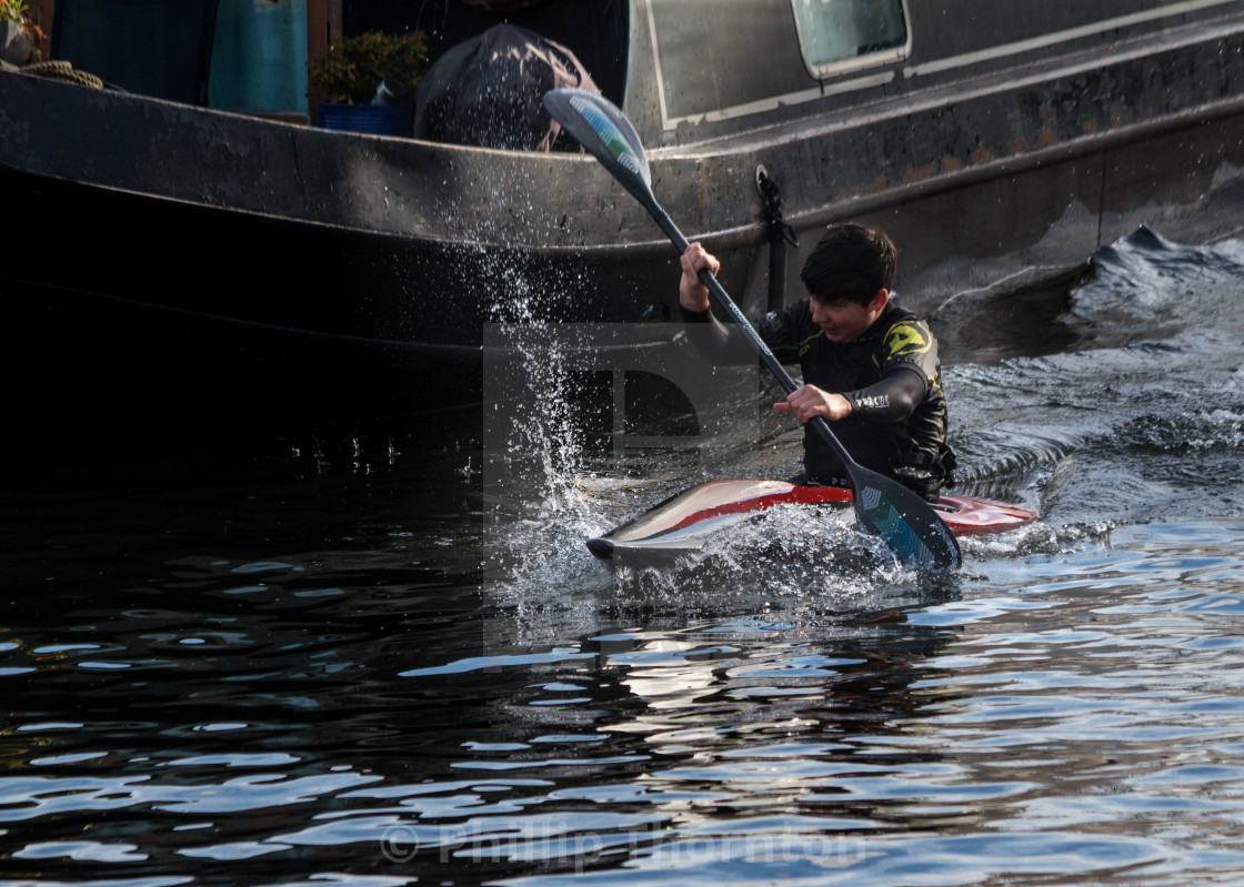 "Kayak beats a barge every time" stock image