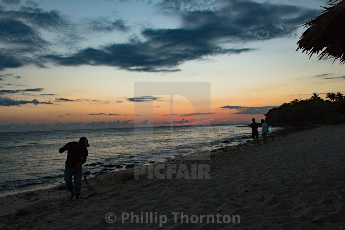 "Early morning beach clean" stock image