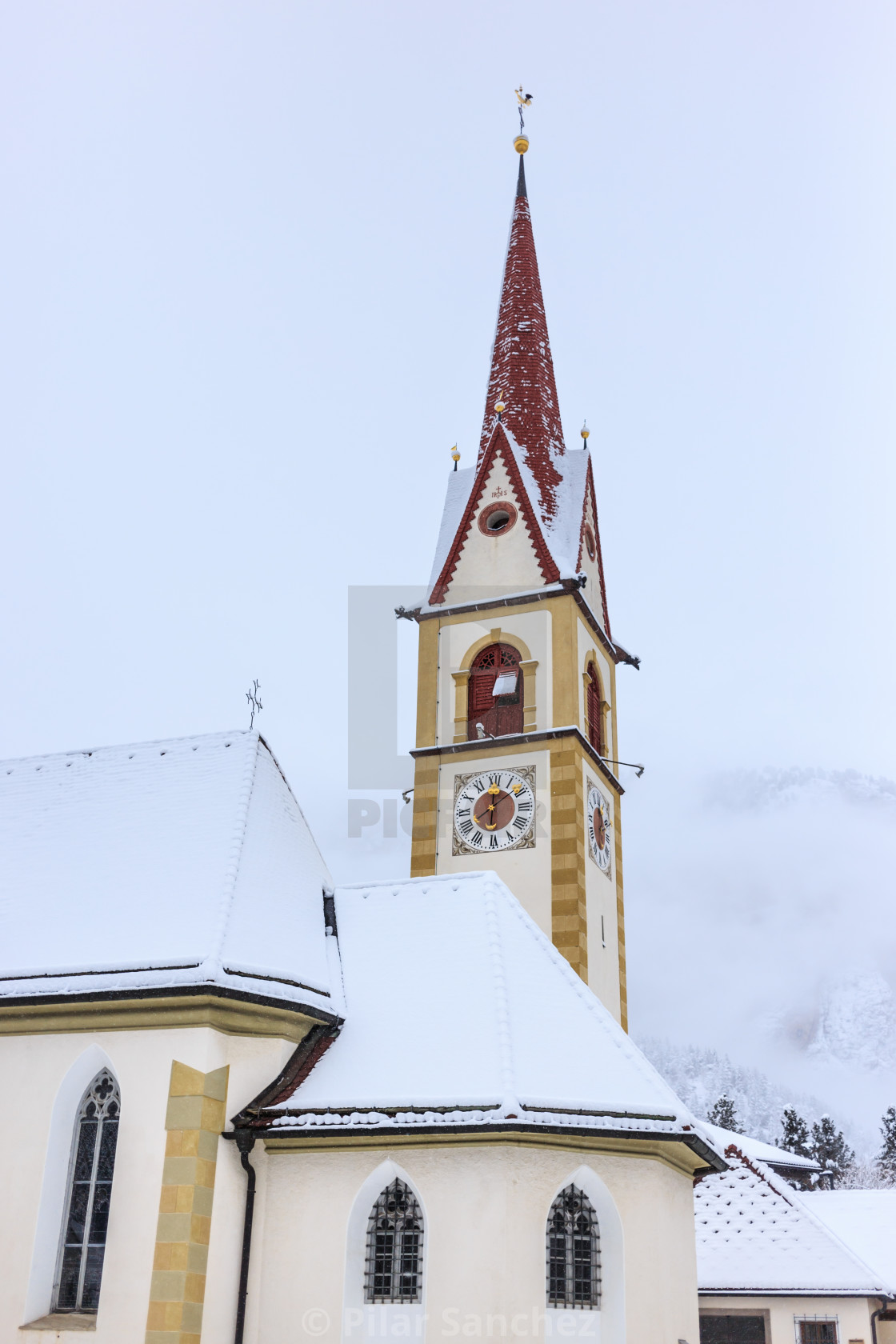 "Maria Hilf parish church of Selva Gardena in the snowy day" stock image