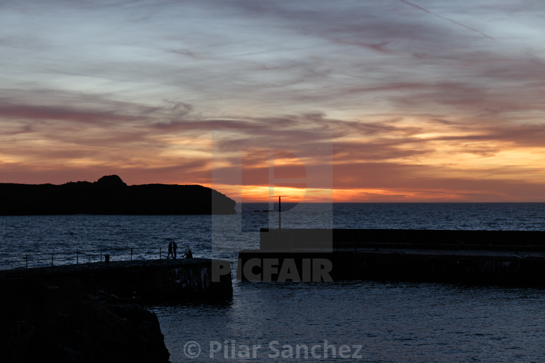 "Sunset at Mullion Cove harbour, Cornwall" stock image