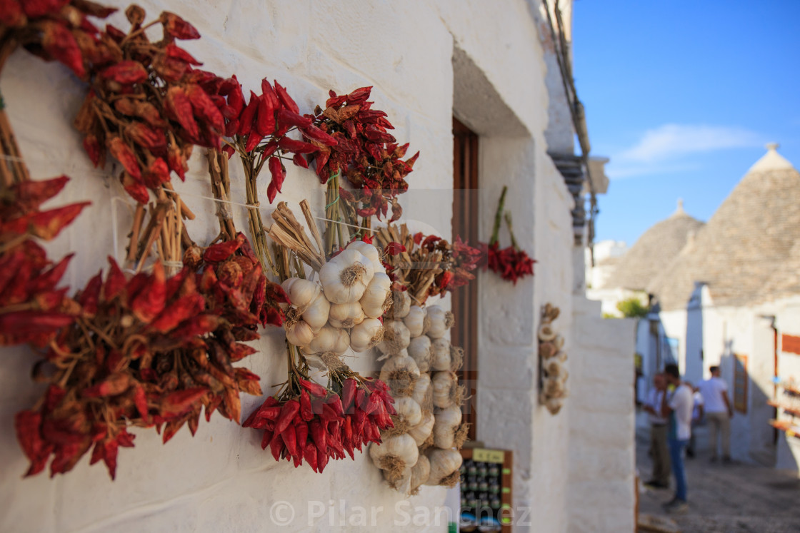 "Red chillies and garlic outside a shop in Alberobello, Apulia, Italy" stock image