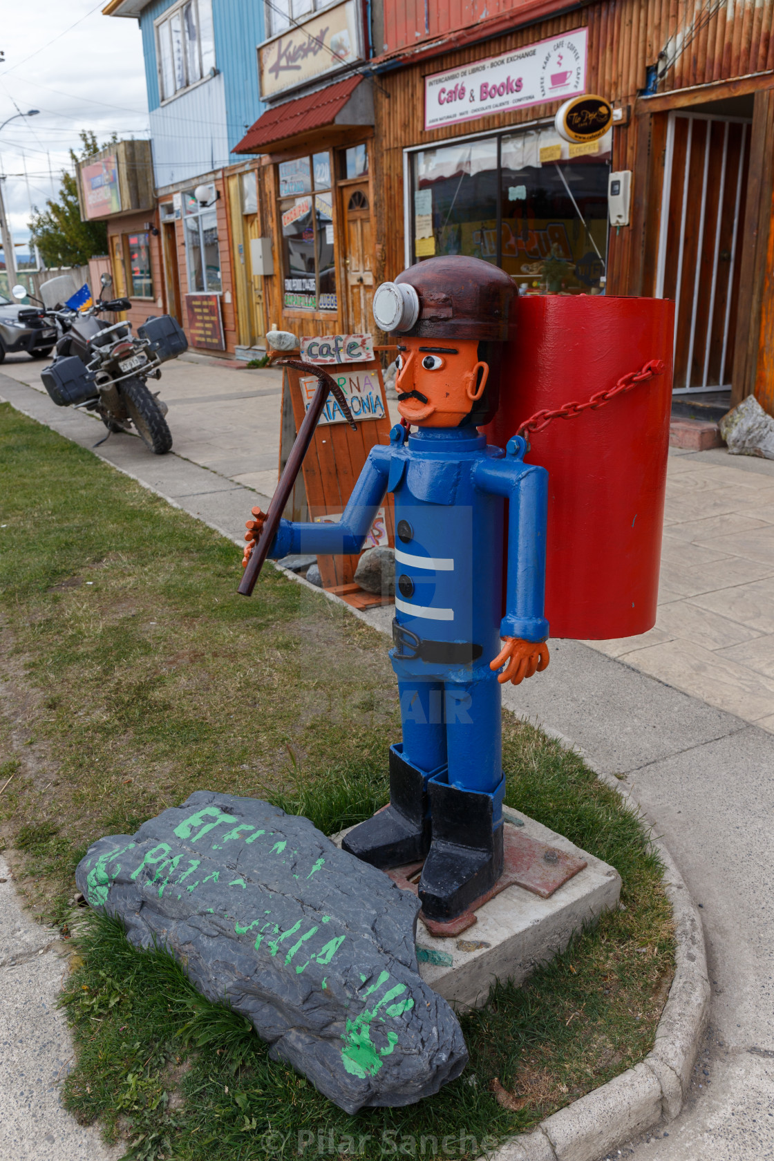 "Street litter bin in Puerto Natales in the form of a miner, Patagonia, Chile" stock image