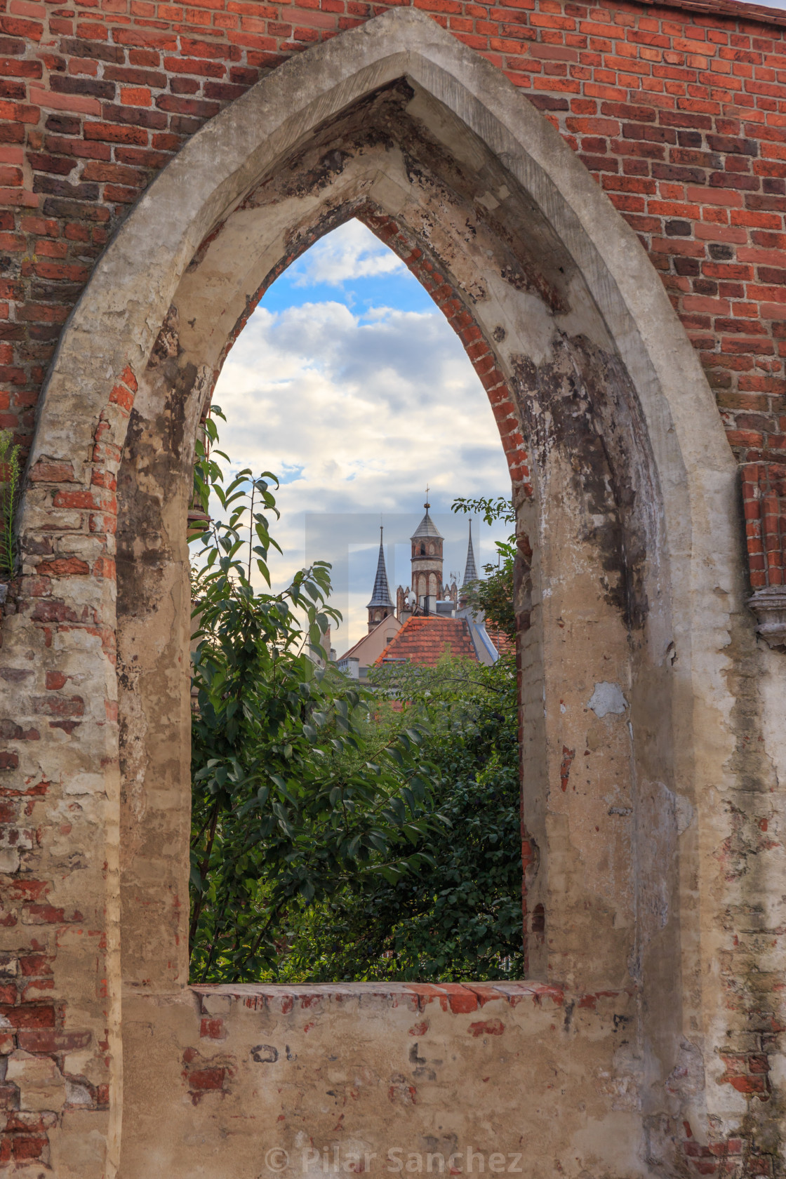 "City view trough a window of the Teutonic castle ruins in Torun, Poland" stock image