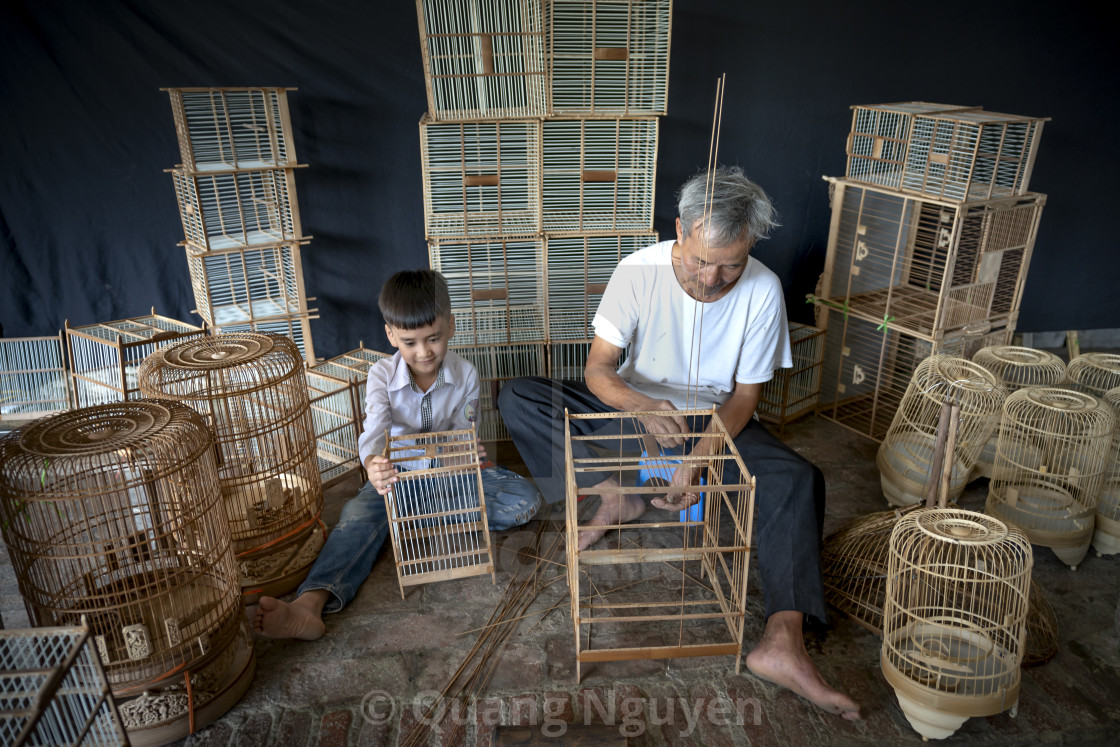 "Picture of an artisan is making bird cages" by Quang Nguyen - $43.35 "Picture of an artisan is making bird cages" stock image