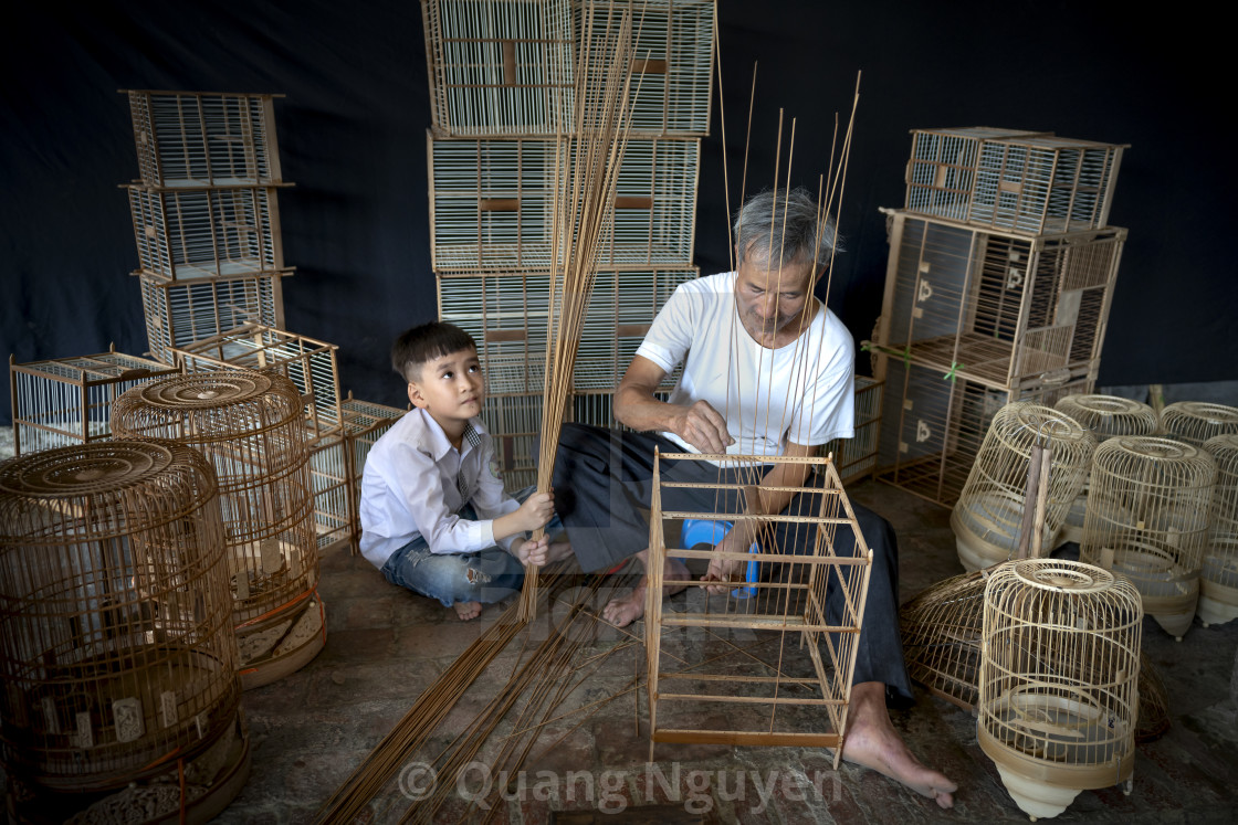 "Picture of an artisan is making bird cages" by Quang Nguyen - $43.35 "Picture of an artisan is making bird cages" stock image