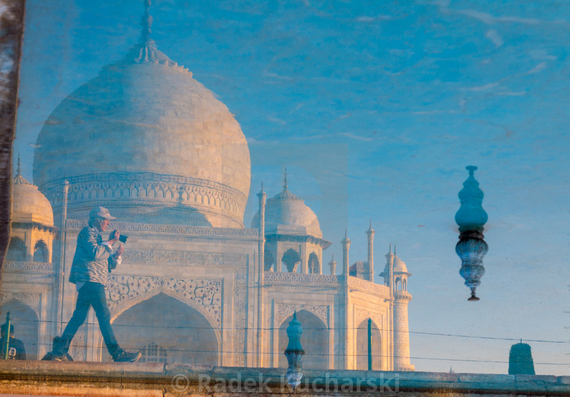 "Taj Mahal and a photographer reflected in the garden's pool" stock image