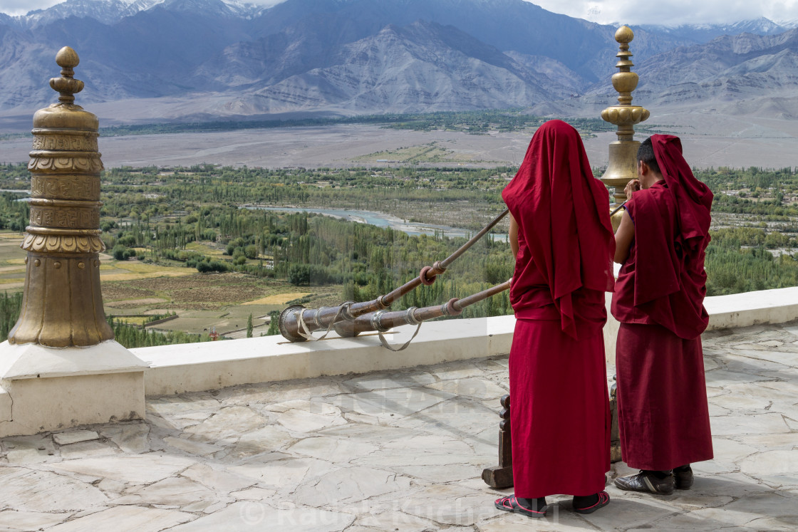 "Thikse Monastery monks playing dungchens (Tibetan horns)" stock image