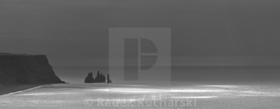 "Reynisdrangar seen from Dyrhólaey cliffs. BnW photograph." stock image