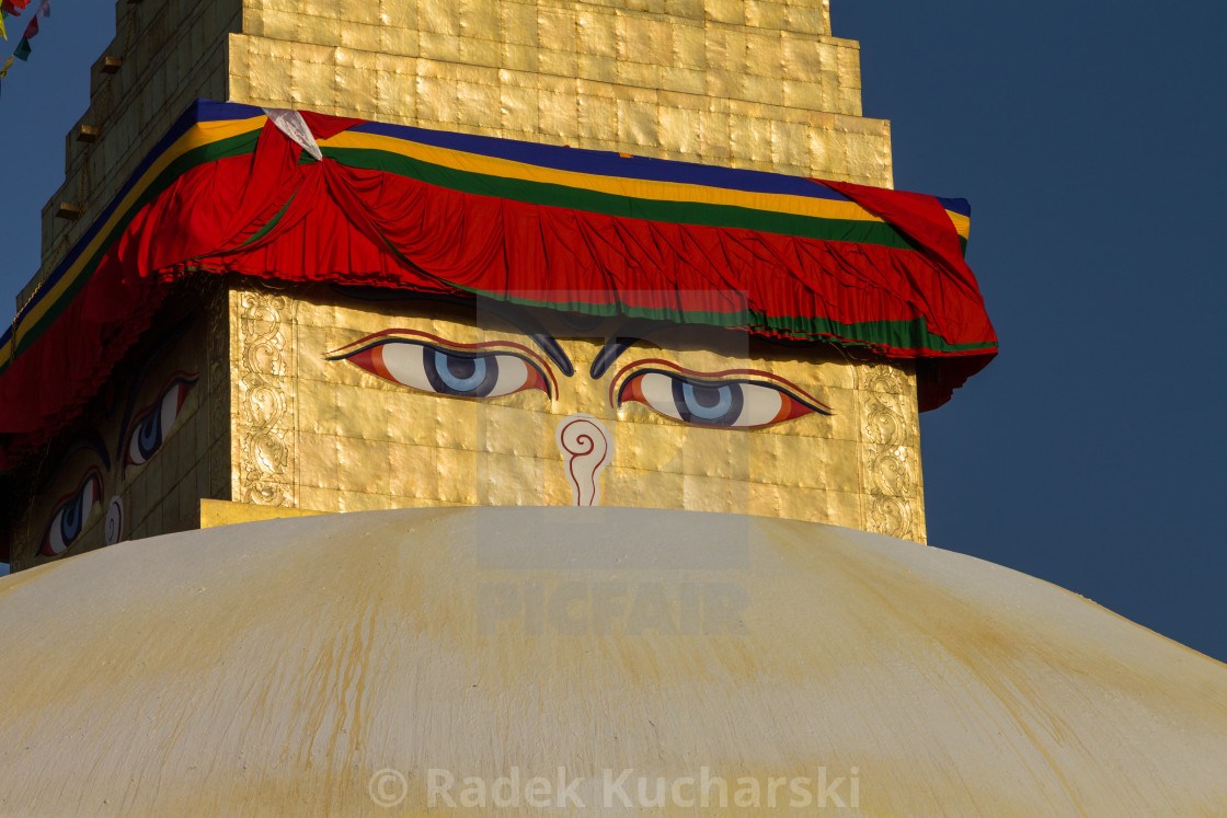 "Eyes of the Buddha or Wisdom Eyes on the golden spire of Boudha" stock image