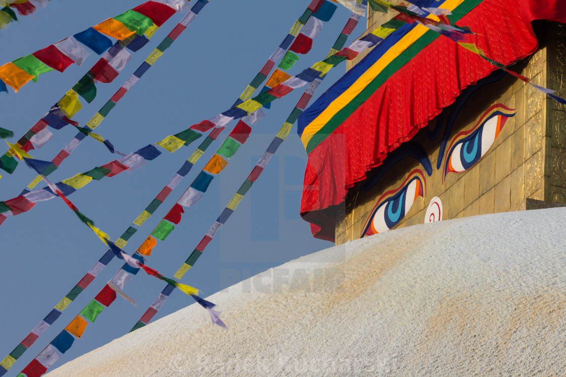 "Buddha's eyes on the golden tower of the Boudha Stupa in Kathmandu" stock image