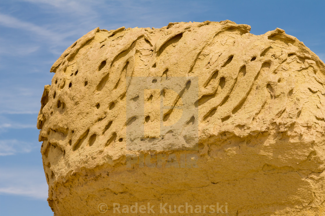 "A sandstone boulder shaped by the wind erosion at Wadi al-Hitan, Sahara" stock image