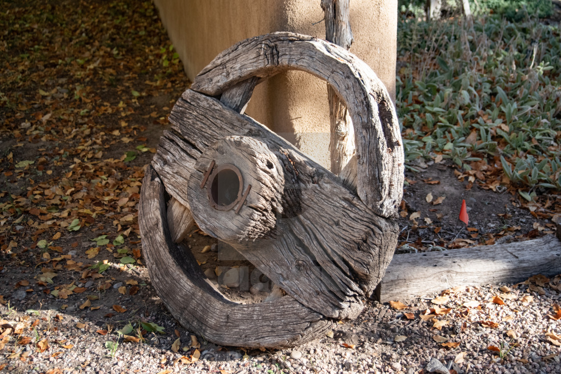 "Antique ox-cart wheel" stock image