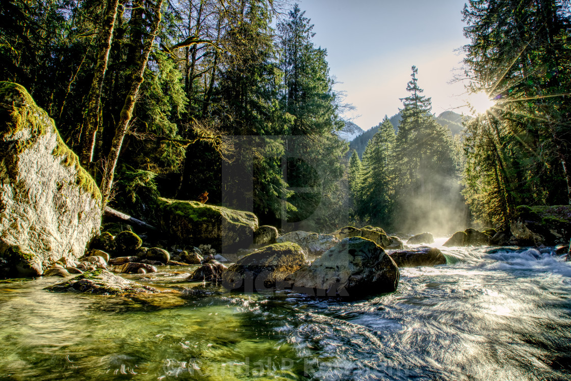 "South Fork Sauk River, Sunburst" by Randal R Ketchem - $15.39 "South Fork Sauk River, Sunburst" stock image