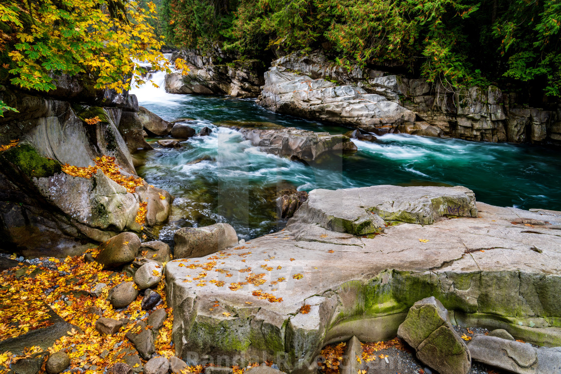 "Fall Color On the Rocks Along Eagle Falls" by Randal R Ketchem - $15.39 "Fall Color On the Rocks Along Eagle Falls" stock image