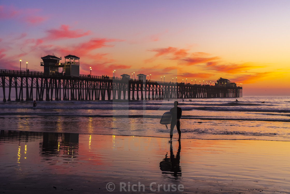 "Surfer at Sunset in Oceanside, CA" by Rich Cruse - $47.81 "Surfer at Sunset in Oceanside, CA" stock image