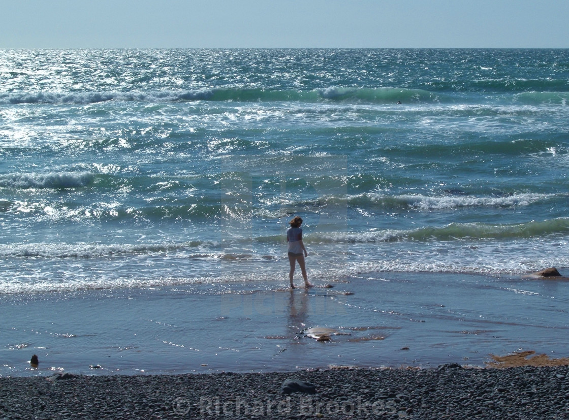 "BEACHCOMBER PADDLING CORNWALL" by Richard Brookes - $18.08 "BEACHCOMBER PADDLING CORNWALL" stock image